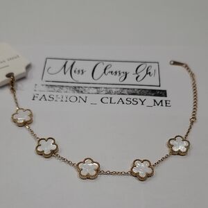 Gold and White Floral Bracelet